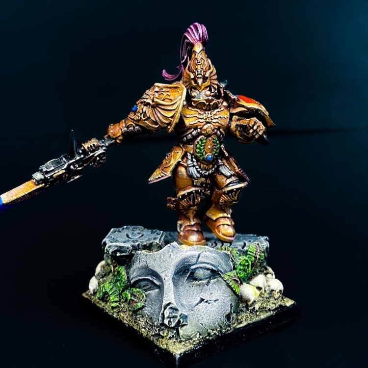 Custodes Guard running on top of a statue