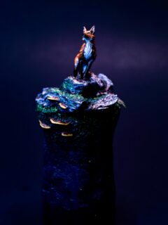 The Fox in the Forest. Here I was inspired by one of my favorite artists @romanlappat.miniatureart following a tutorial on painting a fox. I picked a different fox model but as soon as I saw it on the rock I knew what I wanted to do. I had these resin bases from @tabletopartshop that had slate looking rocks so I incorporated that along with shelf mushrooms and vines. It was a huge success and one of my favorite pieces I had painted recently. #miniaturespainting #nature #forest #fox #wimsical